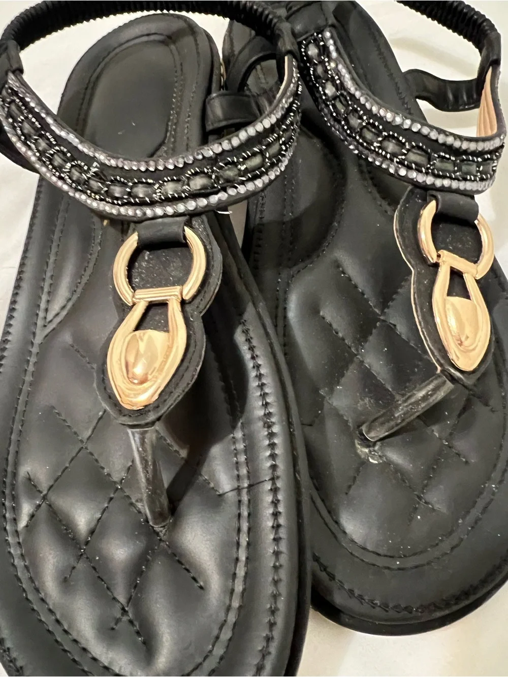 Women's Black Quilted Thong Sandals with Gold Accent